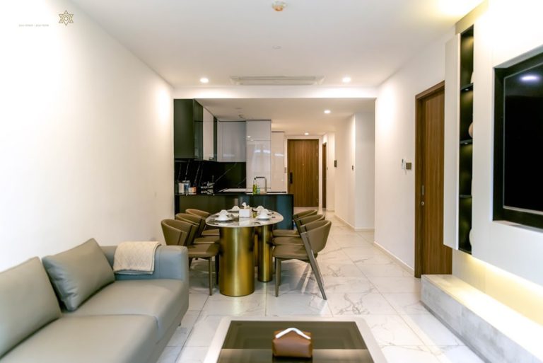 Phòng khách kết hợp bếp và bàn ăn tại căn hộ The Galleria Metropole